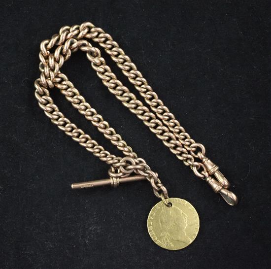 An early 20th century 9ct rose gold curblink Albert hung with a 1787 spade guinea fob, chain 16in.